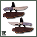 Big Bend fixed-blade knife with a red, white, and blue wooden Texas flag handle, patterned steel blade, and black sheath.