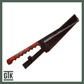 Full-tang Painted Desert long-blade knife showing its contoured red, orange, and black laminated wood handle with brass-toned accents.