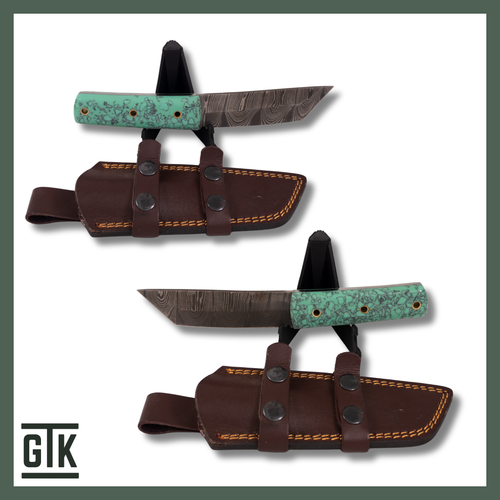 Dry Tortugas full-tang Damascus steel tanto knife with a turquoise-inspired resin handle, brass-colored tubes, and brown sheath.
